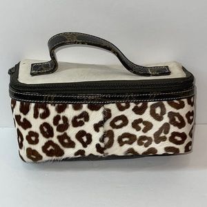 Claudia Roldani makeup bag